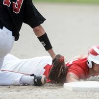 Milan High School first baseman senior Evan Peacock beats Coldwater High School baserunner junior Grand Maurer during the first inning of the MHSAA baseball quarterfinals at Nichols Field at Bailey Park in Battle Creek on Tuesday, June 11, 2013. Melanie Maxwell | AnnArbor.com